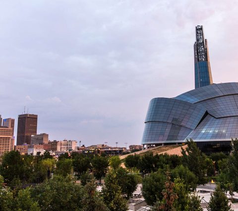 Winnipeg skyline with the Canadian Museum for Human Rights at sunset