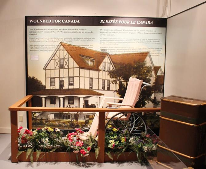 A wheelchair adorned with flowers, honoring wounded veterans and their resilience in service to Canada.