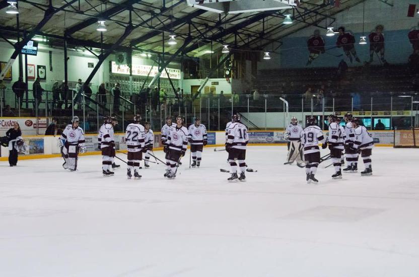 Isang ice hockey team na nag-iinit bago ang isang laro.