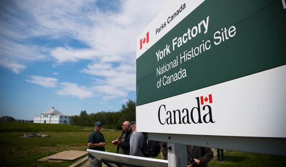 Wayfinding sign at York Factory National Historic Site of Canada, guiding visitors through historic pathways and locations.