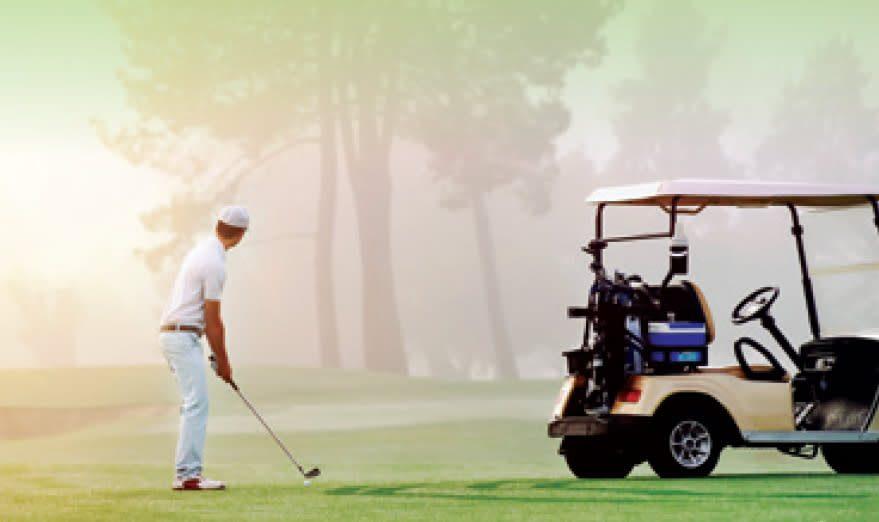 Person in fog at Miniota Golf Course, preparing for final chip onto green, encapsulating serene golfing ambiance in Manitoba.