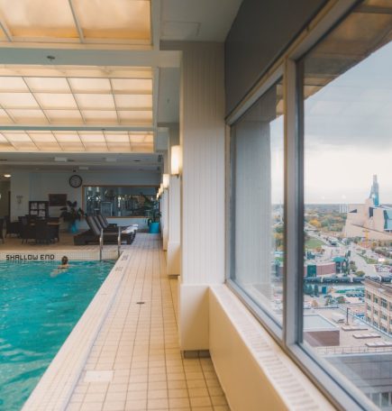 Pool and city view from a high floor.