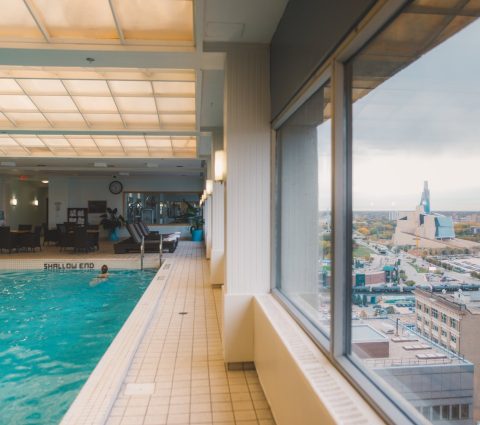 Pool and city view from a high floor.