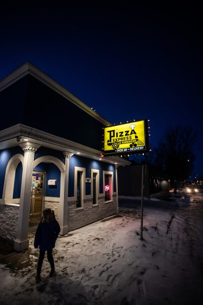 Exterior night shot of the outside of Pizza Express.