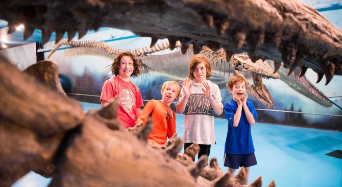 Looking through Bruce's open mouth at four kids pretending to be scared.