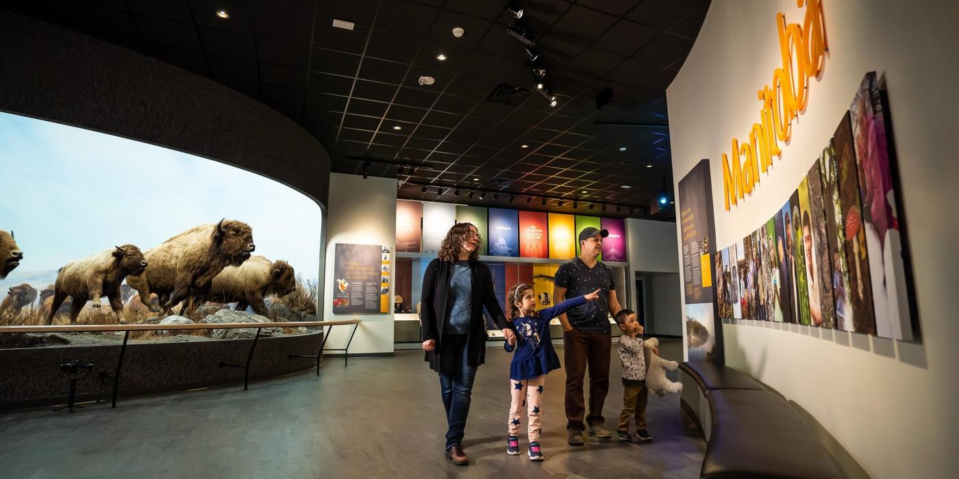 A family looking at the exhibits at the Manitoba Museum