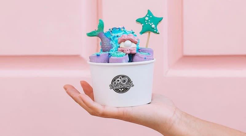 A fancy ice cream with fun shaped frozen treats (a star, fish tail "splashing" into the ice cream), from Milkshake Ice Cream.