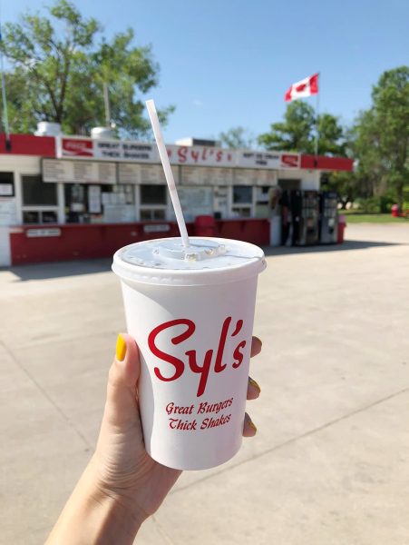 Hold up a milkshake from Syl's Drive In
